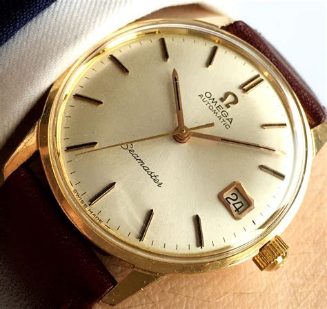 omega 18k gold watch.